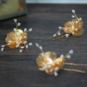 Set of 3 gold hollow flower bridal hair pins with white beads and baroque floral design