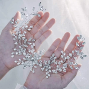 Handmade bridal hair vine with white pearls and crystals on silver wire for weddings