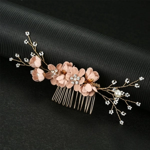 Exquisite pink floral bridal hair comb with pearls and rhinestones on a golden base