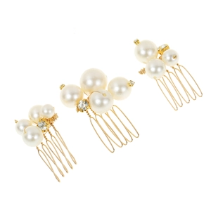 Set of three elegant pearl hair combs with gold metal teeth and sparkling rhinestones