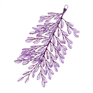 Macro detail of purple crystal leaf hair accessory with woven wire and faceted beads