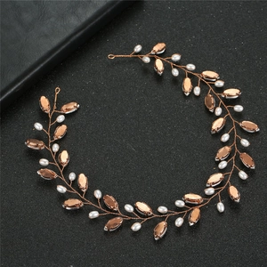 Rose gold bridal headband with amber gems and pearls for wedding hairstyles