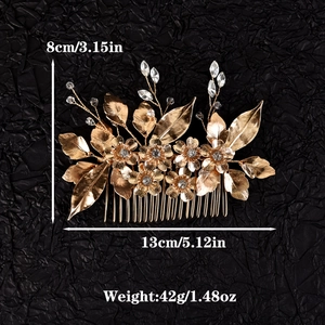 Detail view of handmade bridal gold flower hair comb with size measurements 13cm by 8cm