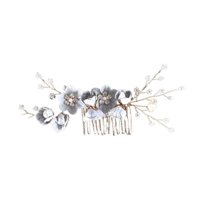 Detail of floral bridal hair comb with grey fabric flowers and crystal rhinestones