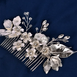 Handmade silver bridal hair comb with crystal flowers and beads for wedding styling