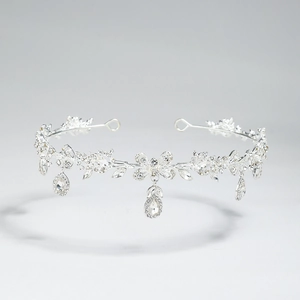 Luxurious silver bridal tiara with butterfly motifs, inlaid crystals and teardrop pendants