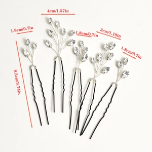 Macro detail of U-shaped hair pins with sparkling clear rhinestones and black metal finish