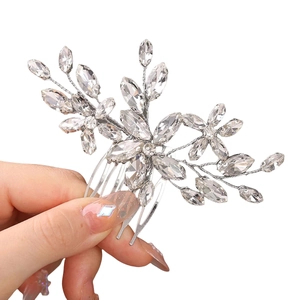 Exquisite bridal hair comb with silver flowers and sparkling rhinestones for wedding