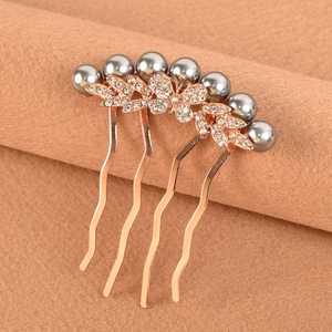 Elegante peine de pelo en oro rosa con perlas grises y mariposas de cristal