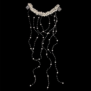Elegant bridal hair comb with clustered white pearls and long hanging pearl tassels