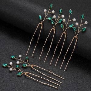 Detail of 6pcs emerald crystal U-shaped hair pins with gold floral wire and pearls