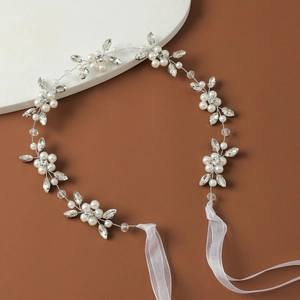 Elegant bridal hair vine with pearls and rhinestones on silver wire and organza ribbon