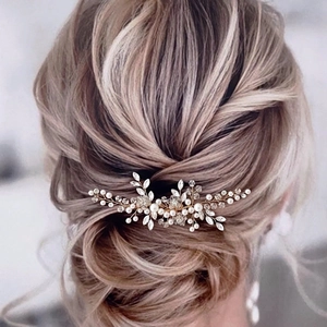 Elegant bridal hair comb with gold wire, pearls and crystals for wedding hairstyles