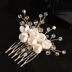 Handmade bridal hair comb with white resin flowers and crystals on gold wire branches