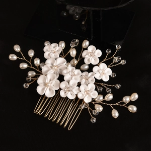 Elegant bridal hair comb with handmade clay flowers and pearls on gold wire
