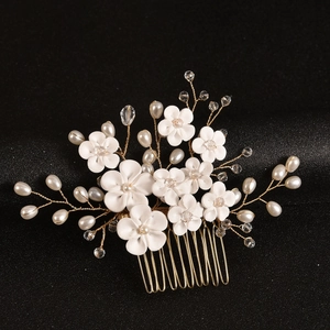 Exquisite bridal hair comb with handmade clay flowers and white pearls on gold wire