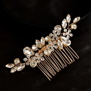 Exquisite gold bridal hair comb with shimmering rhinestone floral and leaf patterns