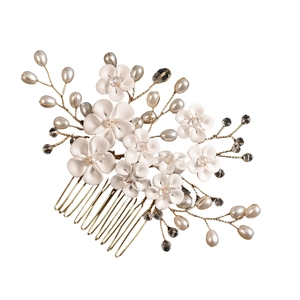 Elegant bridal hair comb with handmade white matte flowers, pearls and golden metal wires