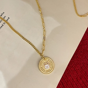 Asymmetric gold rabbit coin necklace with enamel finish and good luck engraving