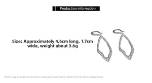 Detailed view of silver zircon geometric leaf earrings with 4.6cm length measurements