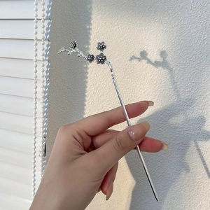 Silver plum blossom hair stick with vintage metal floral design for elegant buns