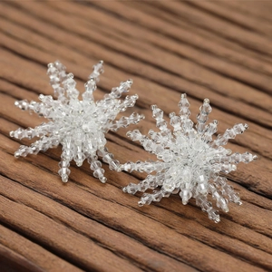 Sparkling crystal snowflake tassel earrings for bridal gowns and photoshoots