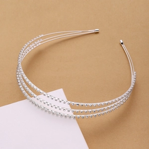 Macro shot of silver triple-layered headband featuring fine crystal rhinestones detail