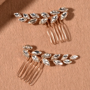 Detail of bridal hair combs featuring marquise rhinestones on rose gold alloy base