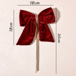 Vintage burgundy velvet bow hair clip with sparkling rhinestone tassels for bridal accessory