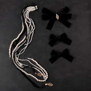 Elegant bridal red hair accessory with bow pearls and tassels for wedding banquets