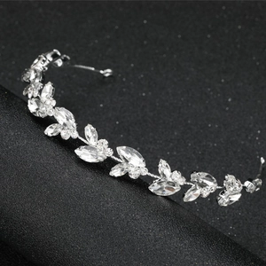 Elegant bridal silver tiara with marquise-cut rhinestones on black background display