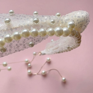 Elegant white lace bridal headband with pearls, sequins and fringe tassel decoration