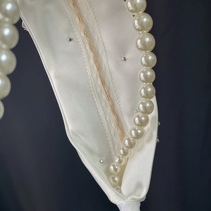 Elegant bridal white satin headband with lace, faux pearls and tassel details
