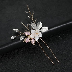 Épingle à cheveux mariée avec feuilles d'opale rose, fleur blanche et pics or rose