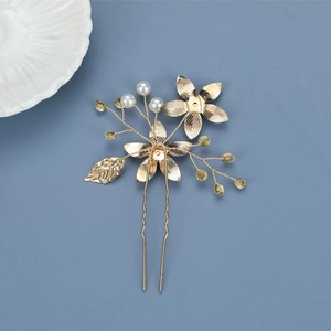 Golden flower and leaf hair pin with pearls and rhinestones for bridal hair styling