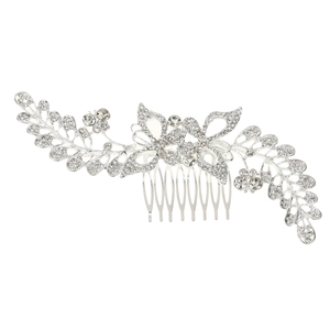 Detail showing crystal-encrusted vine floral patterns on a silver bridal hair comb