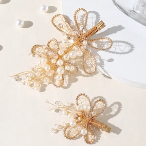 Parure de pinces à cheveux de mariée dorées avec feuilles baroques perles et cristaux