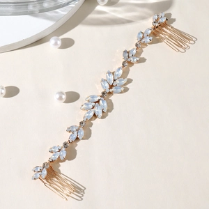Elegant bridal hair comb with blue opal stones and gold leaf design for weddings