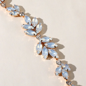 Bridal hair vine with blue opal leaf accents and clear zircons in rose gold finish