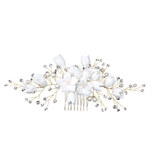 Elegante pettine per capelli da sposa con fiori bianchi e perline champagne