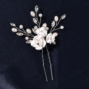 Handmade bridal hair pin with white clay roses, pearls and crystals on blue satin