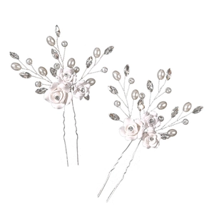 Handmade bridal hair pins with white clay flowers, pearls and crystals in a set of two