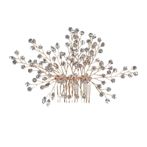 Elegant bridal hair comb with crystal beads and twisted wire branch design on white background