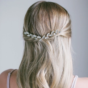 Sparkling crystal marquise bridal hair comb on blonde hair, elegant wedding hair accessory