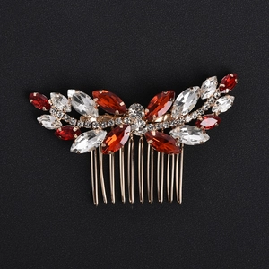 Elegant gold bridal hair comb with deep red marquise gems and sparkling white crystals