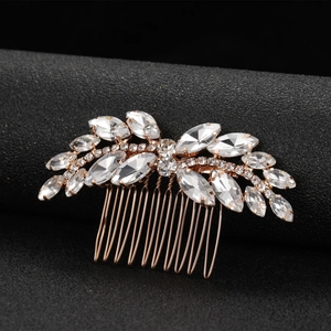 Elegant emerald green rhinestone hair comb with leaf motif for wedding hairstyles