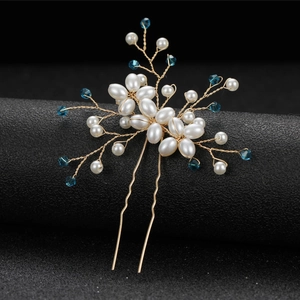 Épingle à cheveux dorée élégante avec cristaux bleu océan et perles pour mariée