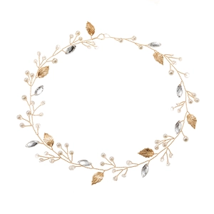 Golden bridal headband with metallic leaves, white pearls and sparkling crystals on white background