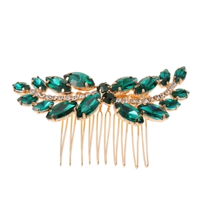 Elegant gold bridal hair comb with emerald green rhinestones in a leaf-like design