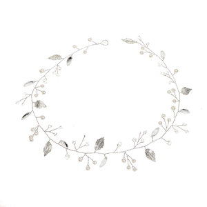 Detail of silver bridal hair vine with pearls, crystals and metallic leaves for weddings